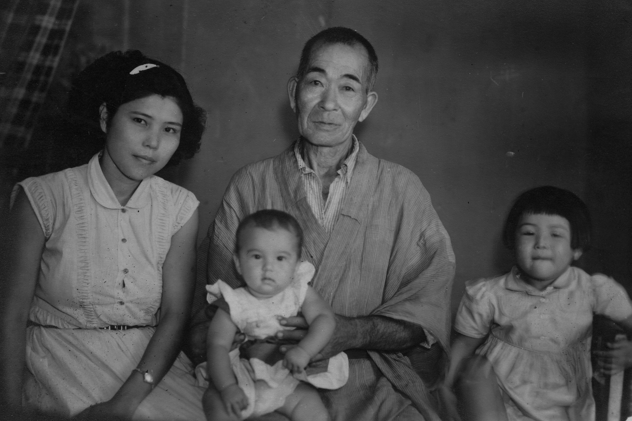 My grandmother in Okinawa with her two children before having to give up one